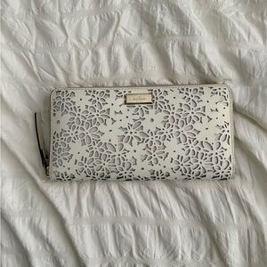 kate spade White Laser-Cut Floral Zip Wallet with Gold Plaque